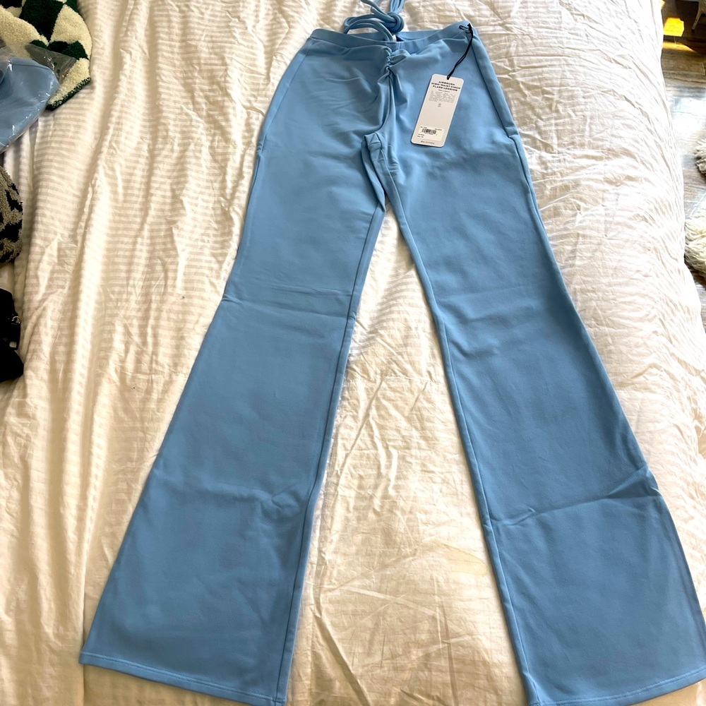 Alo, never worn, with tag, blue, high-waisted, flare cut leggings, size X-small